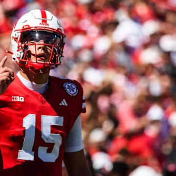 Dylan Raiola walks onto the field as Nebraska's starting quarterback for the first time. 