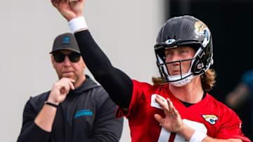 Jacksonville Jaguars quarterback Trevor Lawrence (16) passes as Jacksonville Jaguars head coach Liam Coen watches during the Jacksonville Jaguars’ mandatory minicamp Tuesday June 10, 2025 at the Miller Electric Center in Jacksonville, Fla.
