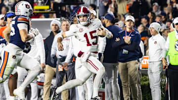 Ty Simpson runs in the Iron Bowl