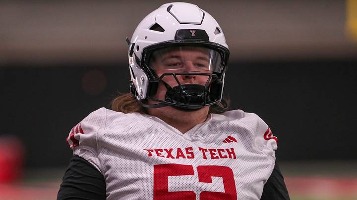 Offensive lineman Cash Cleveland goes through warmups during Texas Tech football practice, Thursday, July 31, 2025, at the Womble Football Center.