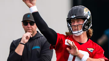 Jacksonville Jaguars quarterback Trevor Lawrence (16) passes as Jacksonville Jaguars head coach Liam Coen watches during the Jacksonville Jaguars’ mandatory minicamp Tuesday June 10, 2025 at the Miller Electric Center in Jacksonville, Fla. [Doug Engle/Florida Times-Union]