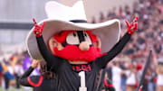 The Texas Tech mascot gestures to the crowd,