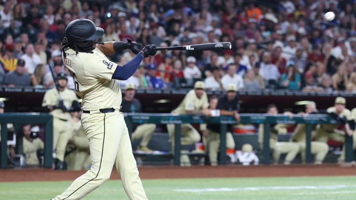 Arizona Diamondbacks first baseman Josh Bell (36) hits a single on Aug. 30, 2024 at Chase Field in Phoenix.