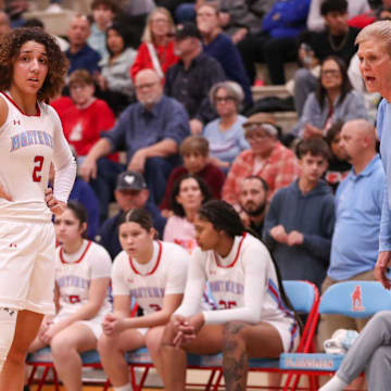 Monterey head coach Jill Schneider (right) talks to Aaliyah Chavez during a District 3-5A girls basketball game, Friday, Dec. 20, 2024, at Monterey High School. Chavez scored 36 points to give her 4,339 for her career.