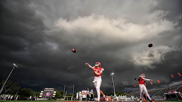 Manatee getting warmed up with bad weather in the background 