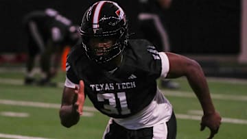 Stanford transfer David Bailey goes through a drill during Texas Tech's spring football practice, Tuesday, April 8, 2025, at the Womble Football Center.