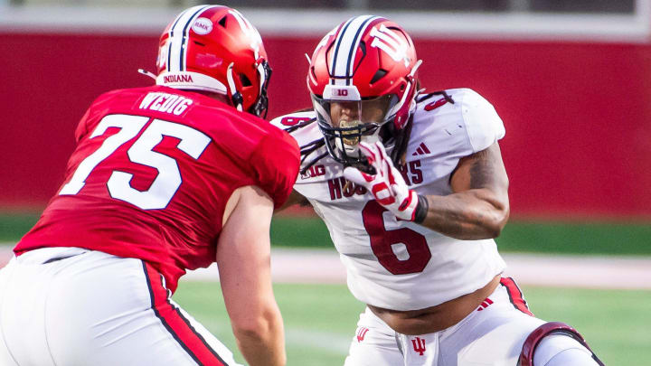 Indiana's Mikail Kamara (6) works against Indiana's Trey Wedig (75) during the Indiana football spring game at Memorial Stadaium on Thursday, April 18, 2024.