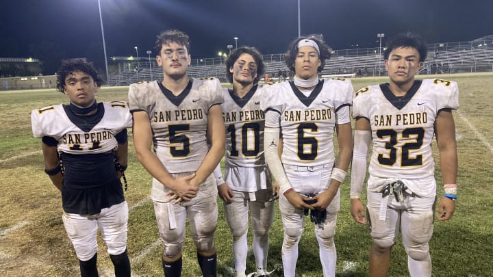 San Pedro High football players after a big win over Granada Hills Kennedy High in Week 1 of the 2024 season.