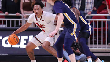 Texas Tech's Darrion Williams backs down a Northern Colorado defender during a non-conference basketball game, Friday, Nov. 29, 2024, at United Supermarkets Arena.