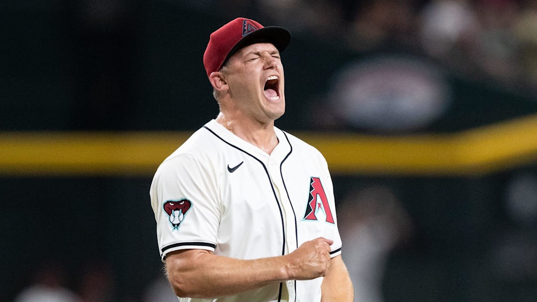 Arizona Diamondbacks pitcher Paul Sewald (38) celebrates after closing the game to win 4-3 against the Pittsburgh Pirates on July 26, 2024, at Chase Field in Phoenix.