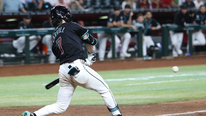 Arizona Diamondbacks outfielder Corbin Carroll (7) hits a grand slam in the eighth inning to take the lead 8-5 on Aug. 28, 2024 at Chase Field in Phoenix.