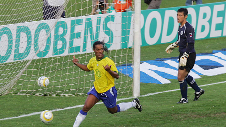 Brazilian Ronaldinho Gaucho celebrates h