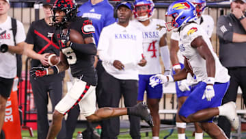 Texas Tech's Caleb Douglas runs after a catch against Kansas during a Big 12 Conference football game, Saturday, Oct. 11, 2025, at Jones AT&T Stadium in Lubbock.