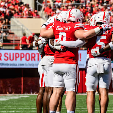 The Husker defense huddles before taking the field against UTEP.