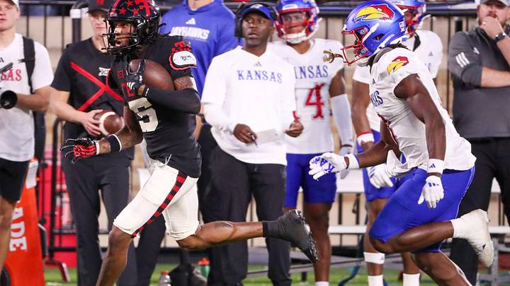 Texas Tech's Caleb Douglas runs after a catch against Kansas during a Big 12 Conference football game, Saturday, Oct. 11, 2025, at Jones AT&T Stadium in Lubbock.