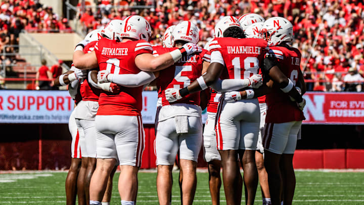 The Husker defense huddles before taking the field against UTEP.