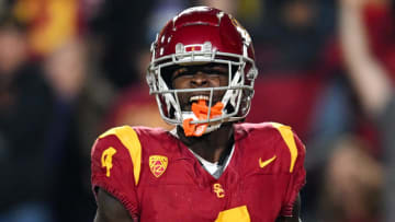 Nov 4, 2023; Los Angeles, California, USA; USC Trojans wide receiver Mario Williams (4) reacts after scoring against the Washington Huskies during the third quarter at United Airlines Field at Los Angeles Memorial Coliseum. Mandatory Credit: Jonathan Hui-USA TODAY Sports