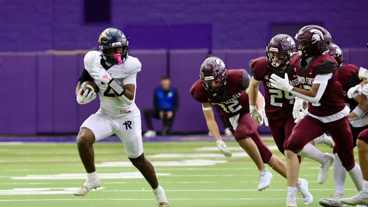 Savion Miller and Iowa City Regina topped Grundy Center in the Class 1A Iowa high school football semifinals.