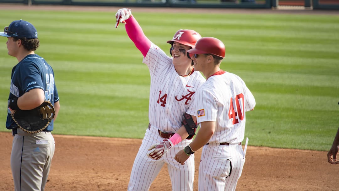 Alabama outfielder Peyton Steele celebrates a hit in the second game of the series against Rhode Island on Feb. 21, 2026.
