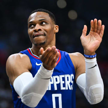 Jan 1, 2024; Los Angeles, California, USA; Los Angeles Clippers guard Russell Westbrook (0) reacts after a teammate scores against the Miami Heat during the third quarter at Crypto.com Arena. Mandatory Credit: Jonathan Hui-USA TODAY Sports