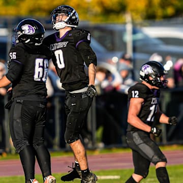 Nick Rogers (0), Jake Mancieri (66) and the Mt. Hope football squad will face East Greenwich in the RIIL Division III semifinals on Friday.