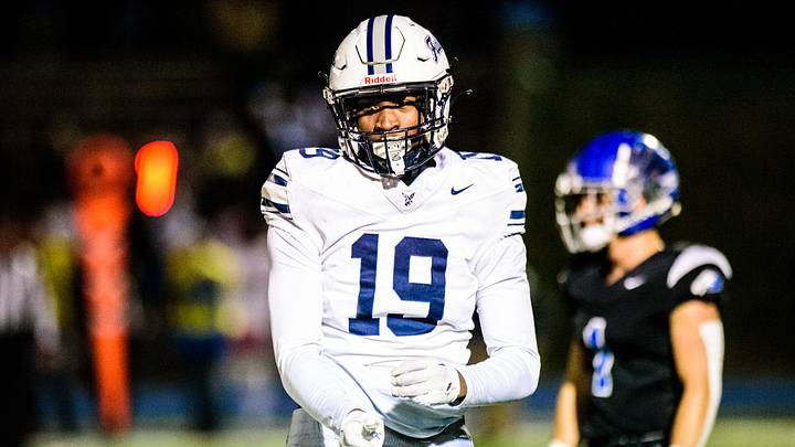 Farmington's Myles Smith celebrates a defensive stop during the Division 2 football district semifinal on Friday, Nov. 1, 2024.