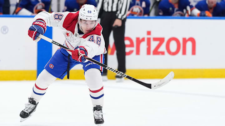 Apr 12, 2026; Elmont, New York, USA; Montreal Canadiens defenseman Lane Hutson (48) passes against the New York Islanders in the third period at UBS Arena. Mandatory Credit: Alexander Wohl-Imagn Images