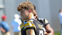 Iowa's Cooper DeJean with Jay Higgins at the team's 2023 media day. (Rob Howe/HN) 