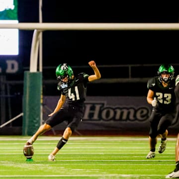 Lutheran South (Texas) kicker Rhet Lavergne hits the squib that won the game for the Pioneers against John Cooper.