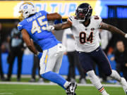 Oct 29, 2023; Inglewood, California, USA; Chicago Bears tight end Marcedes Lewis (84) attempts to block Los Angeles Chargers linebacker Tuli Tuipulotu (45) during second quarter at SoFi Stadium. Mandatory Credit: Jonathan Hui-USA TODAY Sports