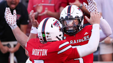 Texas Tech's Coy Eakin celebrates his touchdown catch with Behren Morton (2) against Arkansas-Pine Bluff during a non-conference football game, Saturday, August 30, 2025, at Jones AT&T Stadium.
