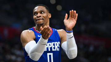 Jan 1, 2024; Los Angeles, California, USA; Los Angeles Clippers guard Russell Westbrook (0) reacts after a teammate scores against the Miami Heat during the third quarter at Crypto.com Arena. Mandatory Credit: Jonathan Hui-USA TODAY Sports