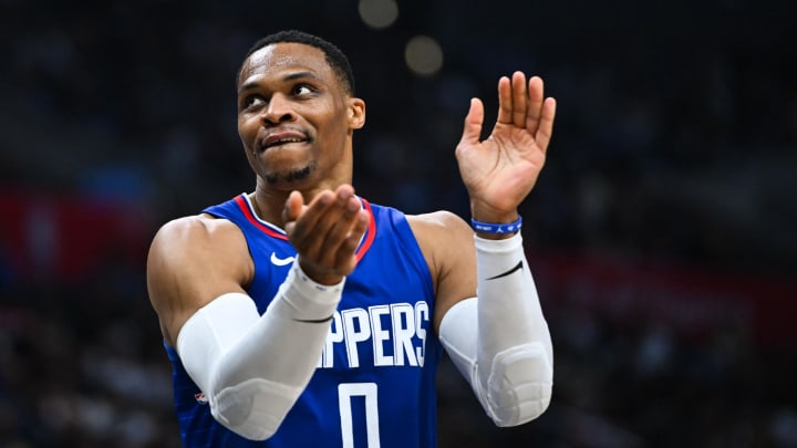 Jan 1, 2024; Los Angeles, California, USA; Los Angeles Clippers guard Russell Westbrook (0) reacts after a teammate scores against the Miami Heat during the third quarter at Crypto.com Arena. Mandatory Credit: Jonathan Hui-USA TODAY Sports