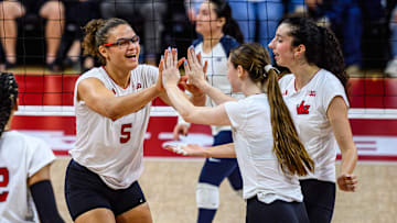 Rebekah Allick high fives Bergen Reilly. 