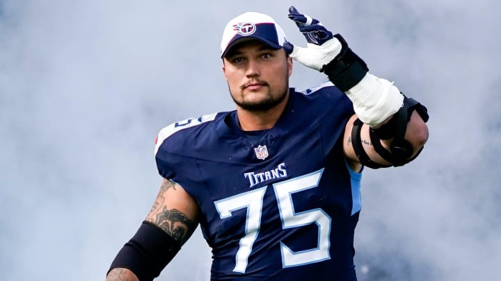 Tennessee Titans offensive tackle Dillon Radunz (75) heads to the field before a game against the Indianapolis Colts at Nissan Stadium in Nashville, Tenn., Sunday, Dec. 3, 2023.