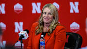 Dani Busboom Kelly speaks to the media. 