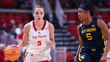 Texas Tech's Denae Fritz dribbles against West Virginia's Sydney Shaw during a Big 12 Conference women's basketball game, Wednesday, Jan. 8, 2025, in United Supermarkets Arena.