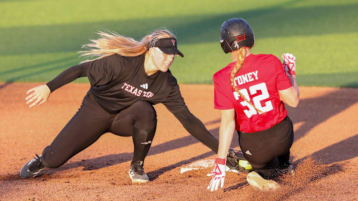 Texas Tech's Mia Williams (left) tags out Hailey Toney during an intrasquad softball scrimmage, Thursday, Sept. 11, 2025, at Rocky Johnson Field.