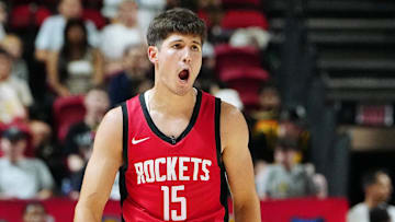 Jul 14, 2024; Las Vegas, NV, USA; Houston Rockets guard Reed Sheppard (15) reacts after scoring against the Washington Wizards during the third quarter at Thomas & Mack Center. Mandatory Credit: Stephen R. Sylvanie-Imagn Images