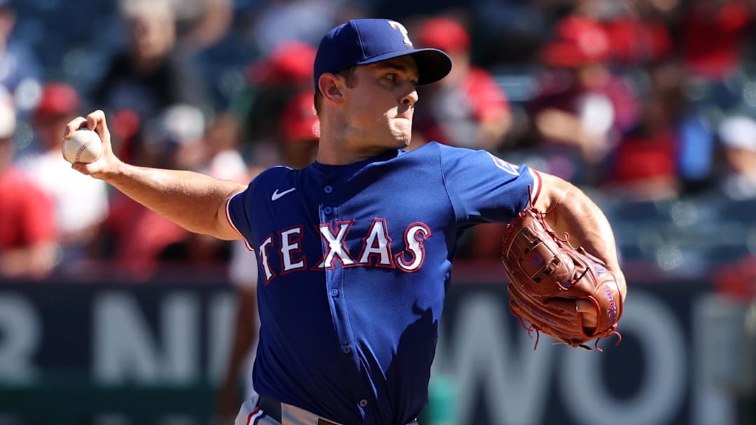 Sep 29, 2024; Anaheim, California, USA;  Texas Rangers relief pitcher David Robertson (37) pitches during the ninth inning against the Los Angeles Angels at Angel Stadium. Mandatory Credit: Kiyoshi Mio-Imagn Images