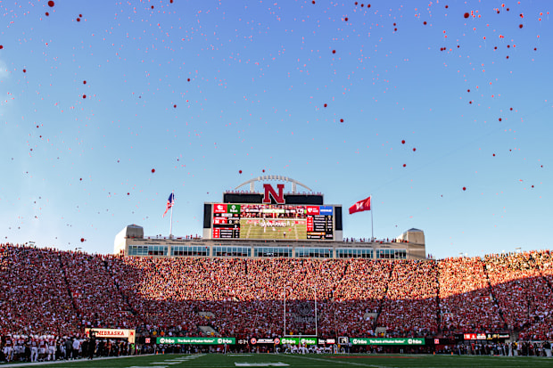 Red balloons fly after the Huskers' first scoring drive of the game for the first time since 2022.