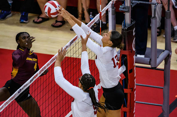 Nebraska volleyball Merritt Beason gets her hands on the ball for a block against Arizona State.