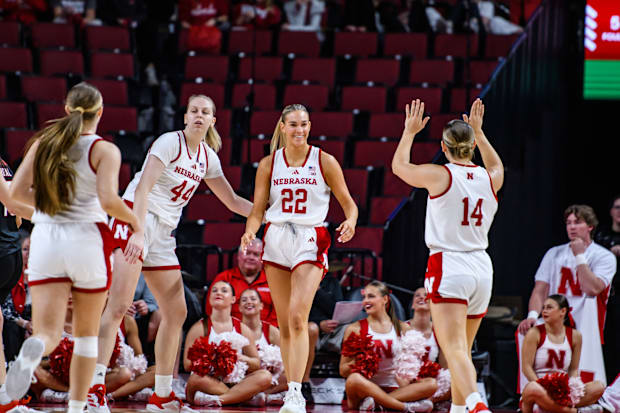Natalie Potts (22) smiles after a foul sends her to the free throw line for an and-one. 
