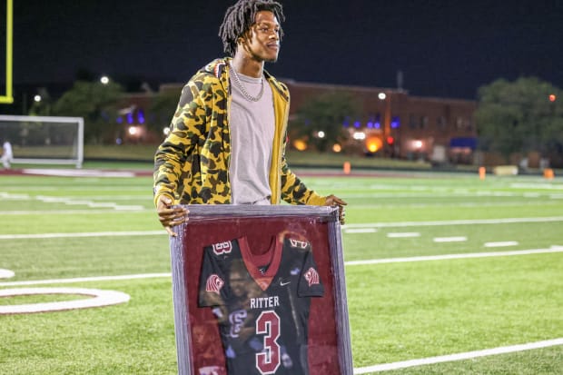 Detroit Lions wide receiver Jameson Williams had his number retired by Cardinal Ritter College Prep on Friday, Aug. 30, 2024.