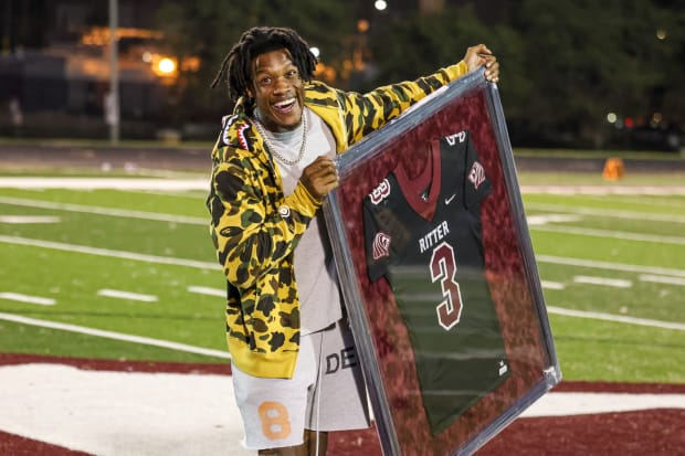 Detroit Lions wide receiver Jameson Williams had his number retired by Cardinal Ritter College Prep on Friday, Aug. 30, 2024.