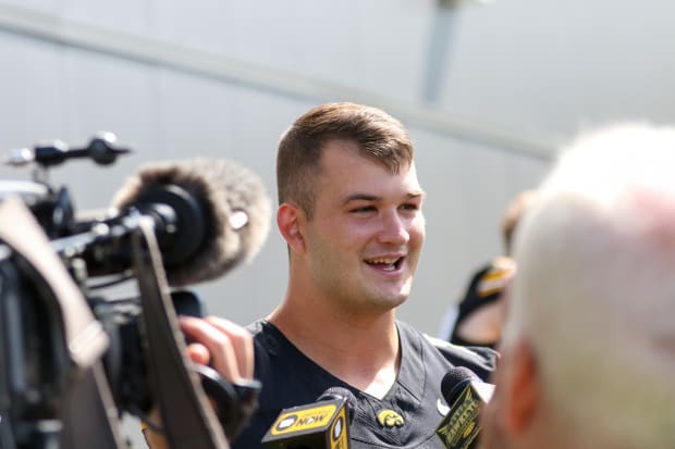 Iowa TE Luke Lachey speaks with reporters at the team's annual media day on Aug. 9, 2024 in Iowa City. (Rob Howe/HN)