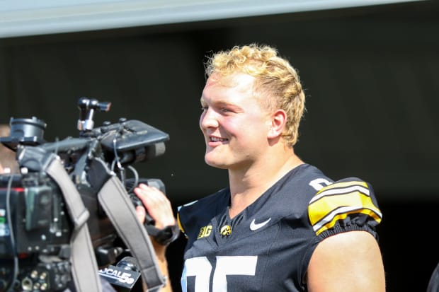 Iowa DL Aaron Graves talks with reporters  at the team's annual media day on Aug. 9, 2024 in Iowa City. (Rob Howe/HN)