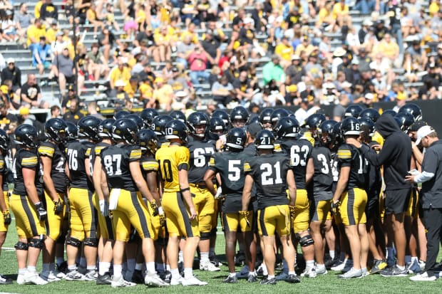 Iowa players huddle during practice on Aug. 10, 2024 in Iowa City. (Rob Howe/HN) 