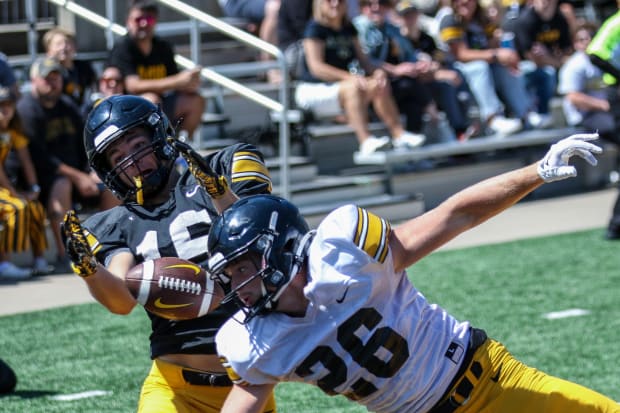 Iowa's Kael Kolarik breaks of a pass intended for Reece Vander Zee at practice on Aug. 10, 2024 in Iowa City. (Rob Howe/HN) 