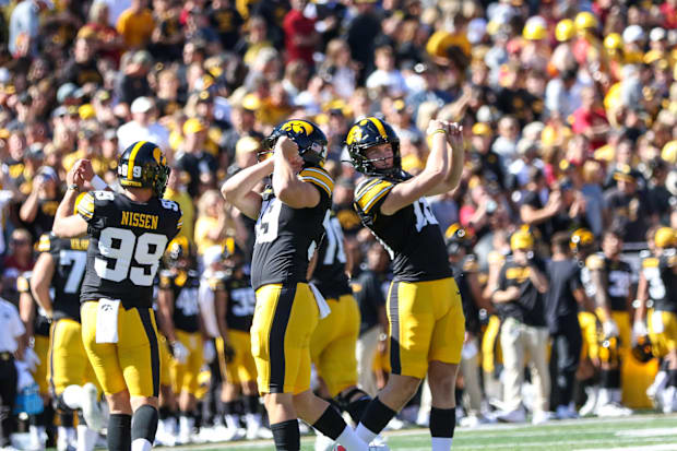 Iowa specialists (L-R) Ty Nissen, Luke Elkin, Drew Stevens. (Rob Howe/HN)